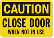 Caution Close Door In Use Sign