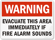 Warning Evacuate This Area Sign