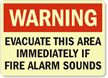 Warning: Evacuate This Area Immediately Sign