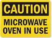 Caution Microwave Oven In Use Sign