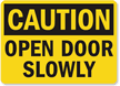 Caution Open Door Slowly Sign