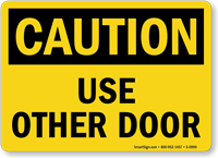 Caution Use Other Door Sign